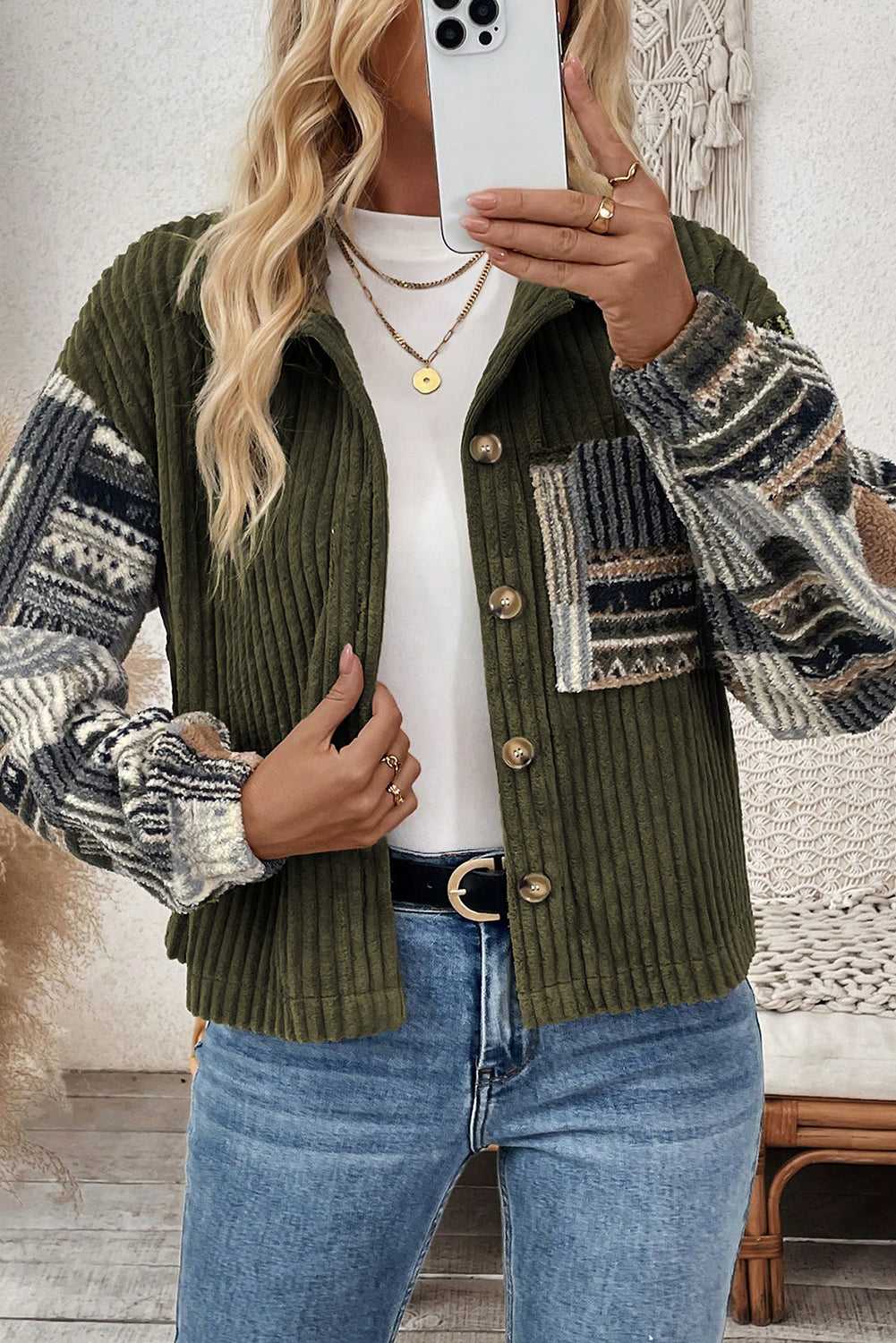 Front close-up of Women's Green Plaid Corduroy Fleece Jacket featuring button-up design and textured patchwork chest pocket.