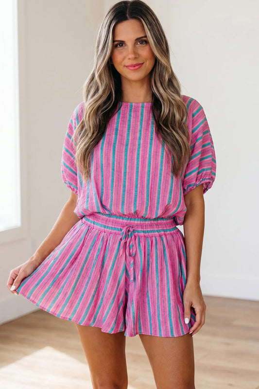 Woman wearing pink stripe dolman blouse and drawstring shorts two piece set, front view, Fashionfitz UK