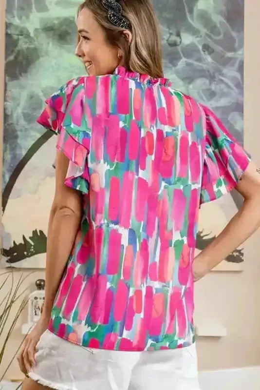 Back view of Abstract Brush Print Ruffled Cap Sleeve Blouse showing relaxed shift silhouette — Fashionfitz