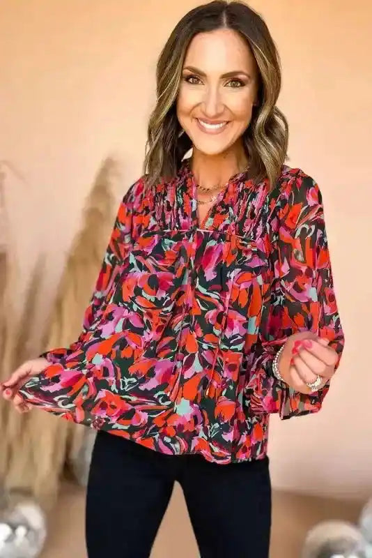 Front view of Abstract Floral Shirred Puff Sleeve Blouse | FashionFitz, featuring shirred detailing and long puff sleeves in a colorful floral design.