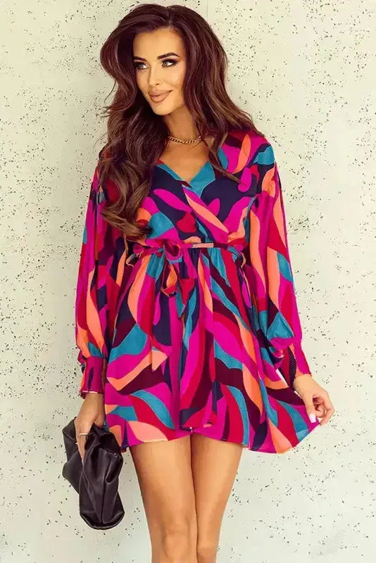 Close-up of bold abstract colour block print and puff sleeve on mini dress Fashionfitz UK