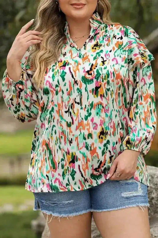 Front view of Abstract Ruffle Blouse with Puff Sleeves - Unique Style, featuring vibrant floral pattern and relaxed fit.