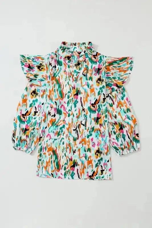 Abstract Ruffle Blouse with Puff Sleeves in multicolor print, featuring a V-neck and flutter shoulder detail, ideal for bold fashion statements.