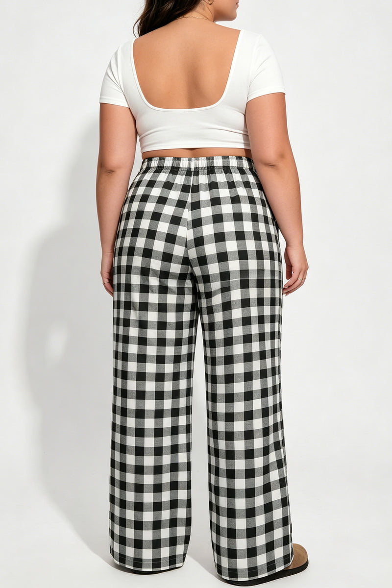 Black plaid plus size trousers — back view showing elastic waist
