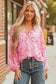 Model wearing Pink Floral Lightweight Blouse outdoors with jeans, perfect for spring casual outings.