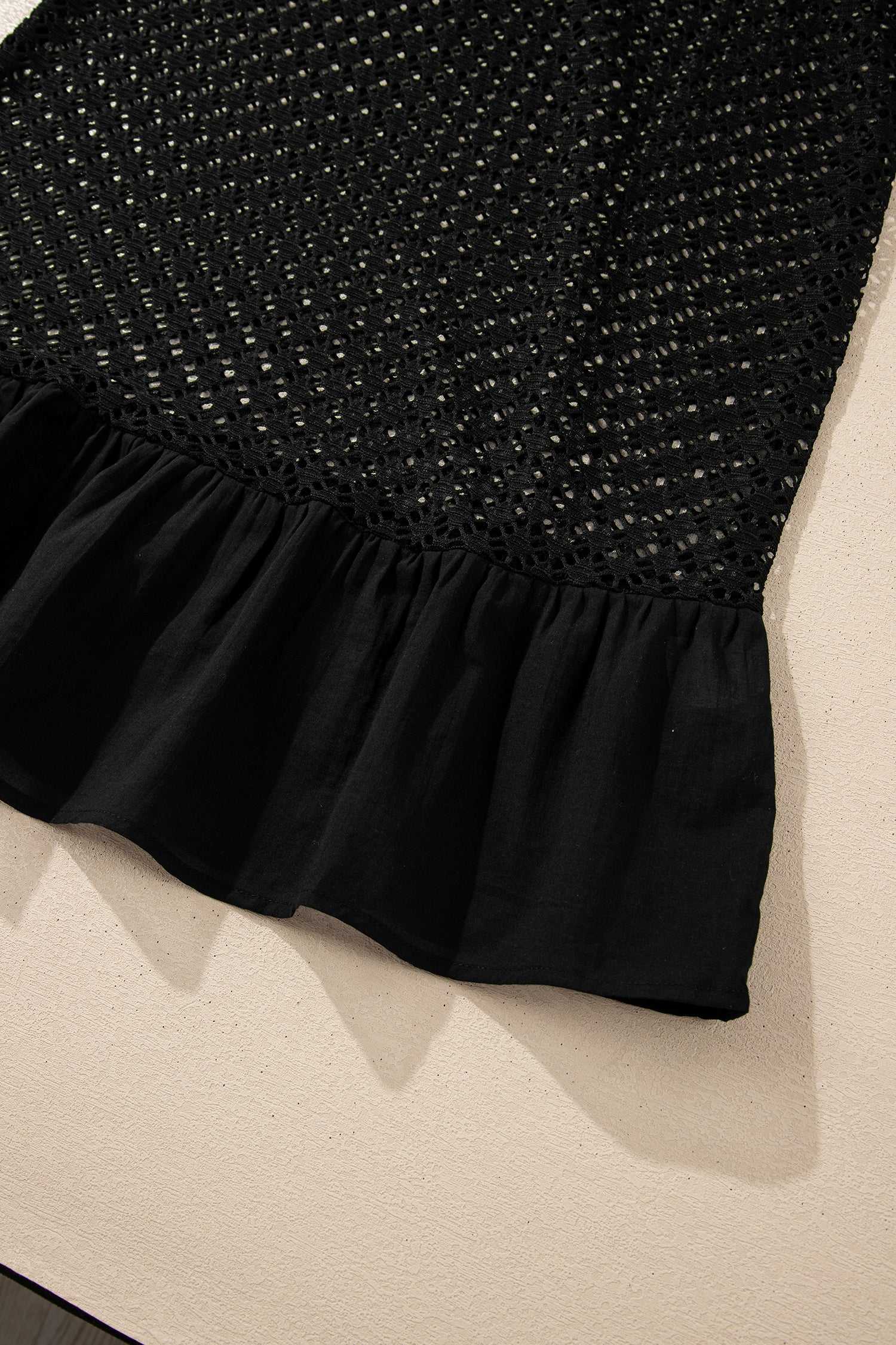 Black crochet beach cover-up with ruffle hem