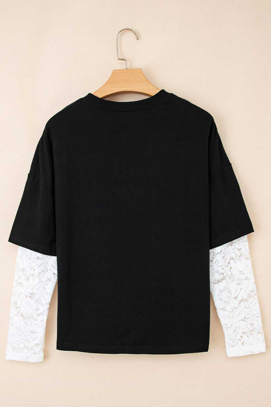 Back view of the Lace Sleeve Drop T-Shirt - Soft & Comfy | FashionFitz, displaying contrast between black fabric and white lace sleeves.
