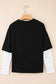 Back view of the Lace Sleeve Drop T-Shirt - Soft & Comfy | FashionFitz, displaying contrast between black fabric and white lace sleeves.
