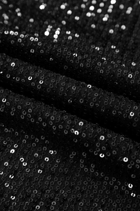 Close-up of black sequin fabric showing shimmering texture, used in elegant open back party tops for night out occasions.