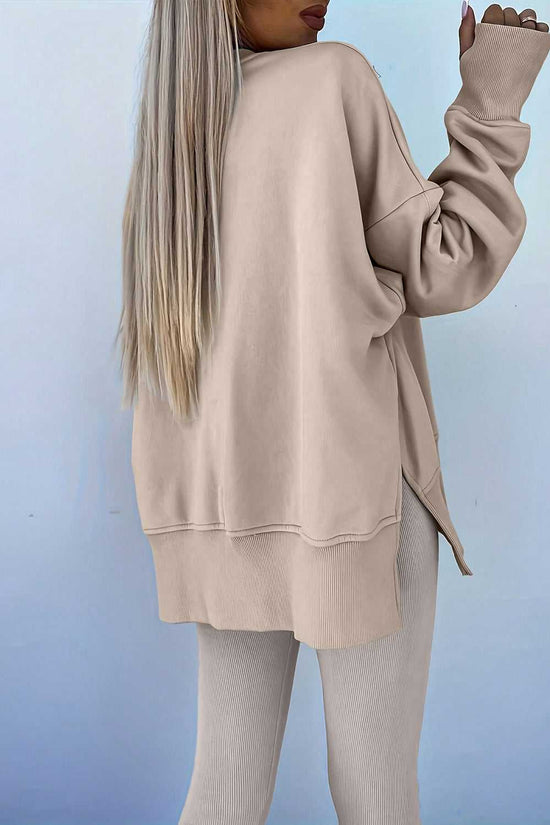 Back view of beige Oversized Sweatshirt and Leggings Matching Set, emphasizing the oversized silhouette and ribbed knit leggings.