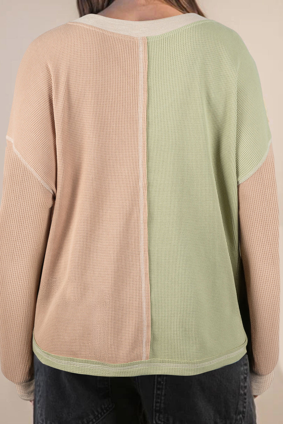 Green patchwork plus size top — side showing mixed texture detail