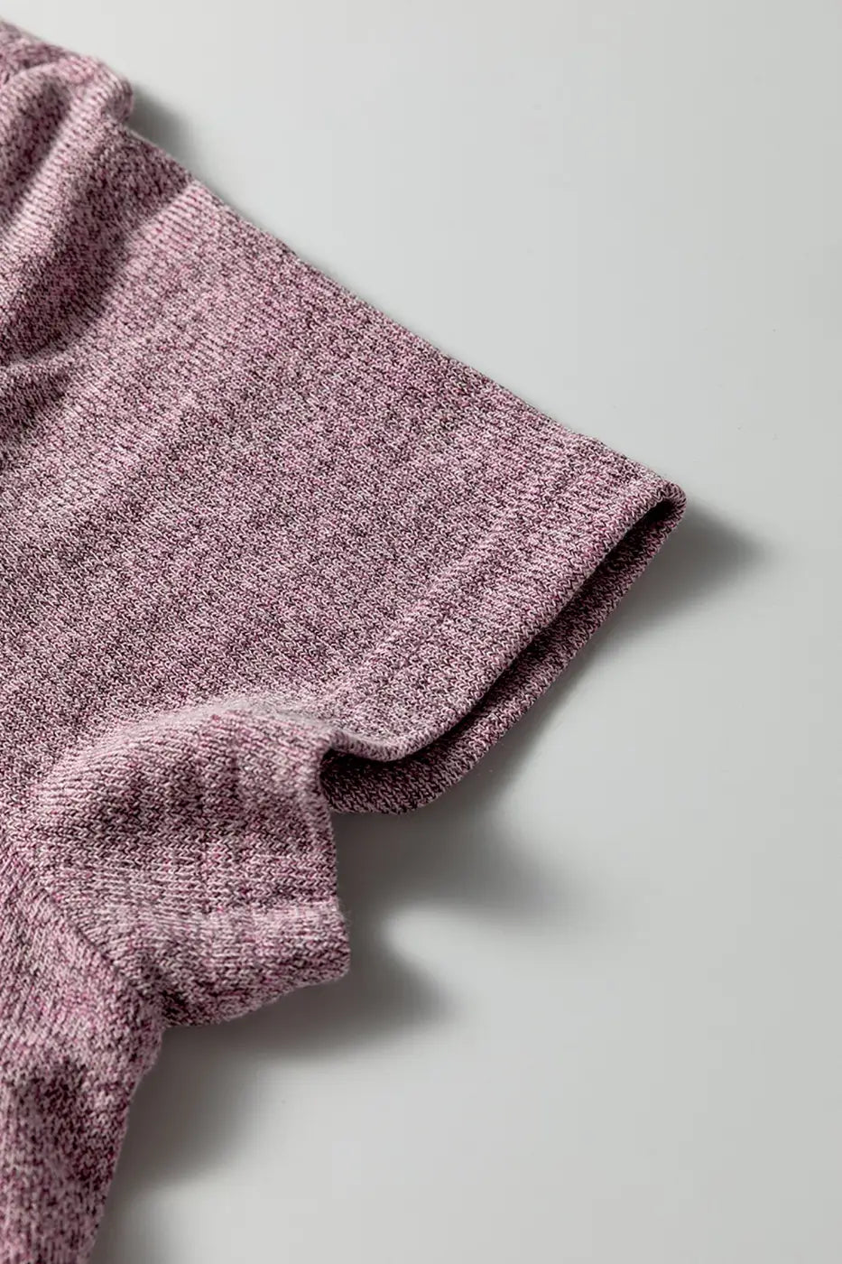 Short sleeve detail of top from Heather Mauve Duster Lounge Trio – 3‑Piece Loungewear Set, highlighting soft knit and rolled hem finish.