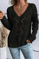 Airy charm drop black v-neck sweater with intricate lace-like pattern for relaxed style