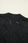 Airy charm drop sweater: black knit with textured pattern and ribbed collar. Relax relax