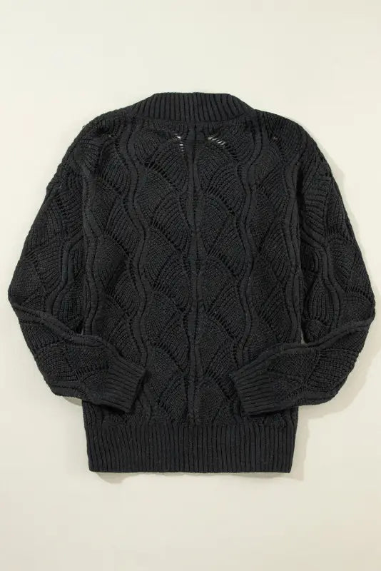 Airy charm drop sweater: black knit sweater with textured cable pattern for ultimate relax