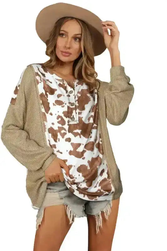 Animal Print Textured Henley Blouse by FashionFitz with leopard-inspired print and button front, styled for smart casual wear.
