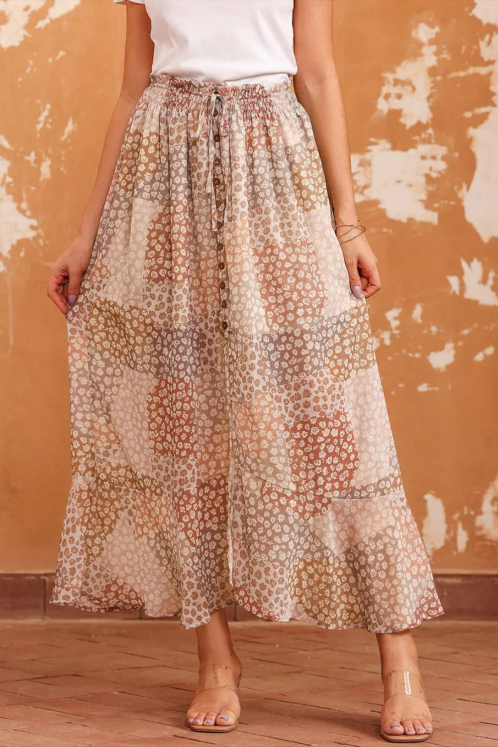 Apricot boho flower print smocked waist button slit maxi skirt - s / 100% polyester - skirts