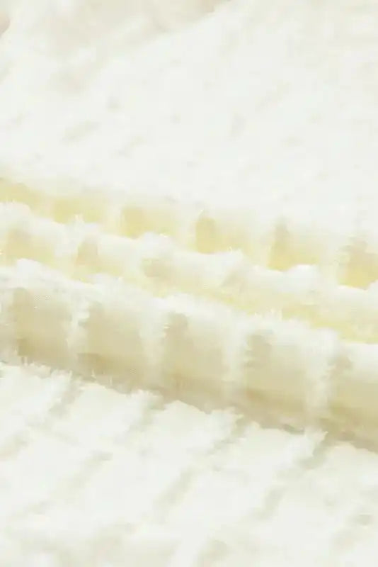 Macro view of Apricot Lattice Set fabric texture, highlighting soft grid pattern and lightweight material.