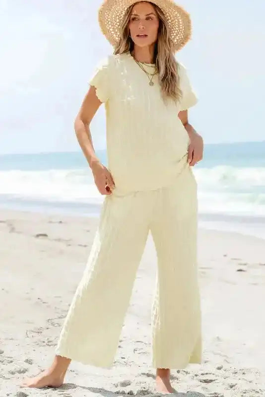 Apricot Lattice Set - Two Piece with batwing sleeve top and flared pants, styled for summer beachwear in textured fabric.