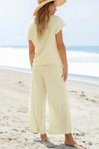 Back view of Apricot Lattice Two Piece Set showing relaxed fit and wide leg pants, ideal for casual summer outings.