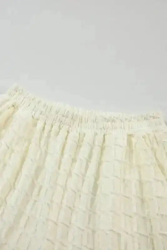 Elastic waistband close-up from Apricot Lattice Pants, showcasing soft stretch fit for casual wear.