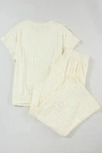 Back flat lay of Apricot Lattice Set - Two Piece highlighting the relaxed silhouette and soft lattice texture.