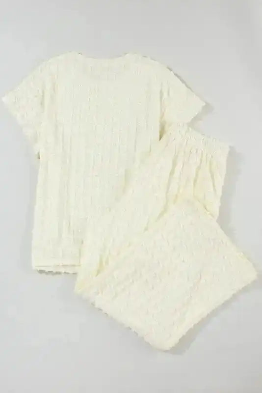 Back flat lay of Apricot Lattice Set - Two Piece highlighting the relaxed silhouette and soft lattice texture.