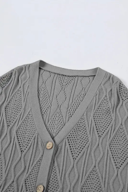 Apricot plus size knitted hollow out button up cardigan