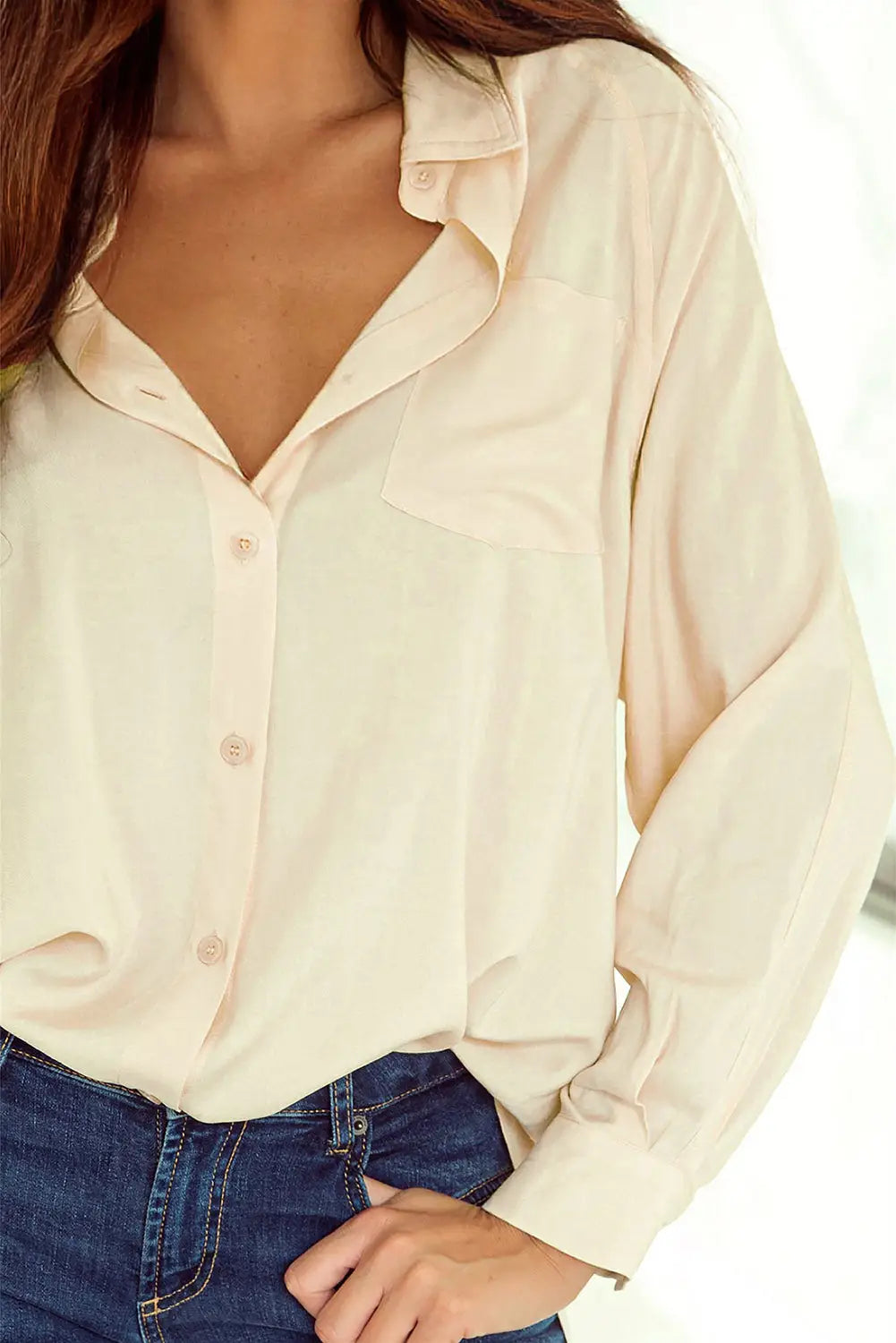 Apricot solid buttoned chest pocket high low loose shirt -