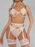 Arabella 4-Piece Garter Set in white featuring sheer lace details and strappy design. Shop women’s lingerie UK with fast shipping.