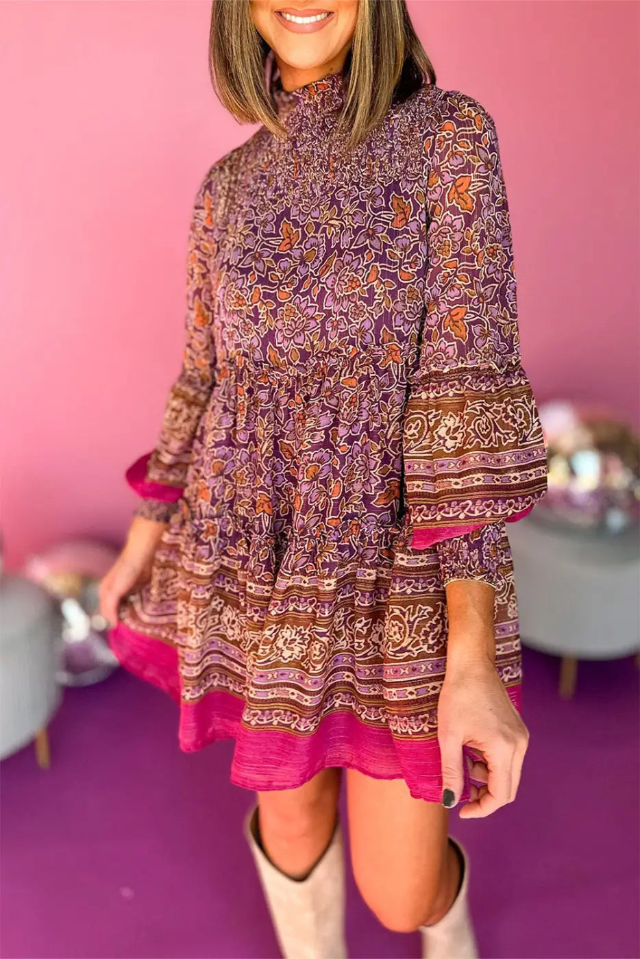 Floral patterned autumn bloom mini dress with high neck and flared sleeves in purple and pink