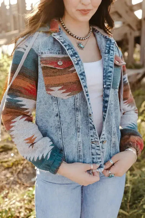 Woman wearing multicolor Aztec print hooded denim jacket with frayed hem front view Fashionfitz UK
