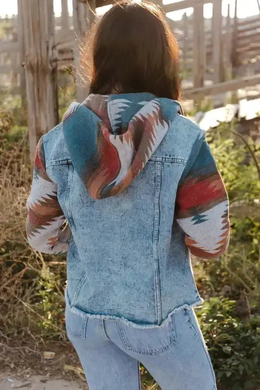 Side view of Aztec print denim jacket showing contrast patterned sleeves and frayed hem Fashionfitz UK