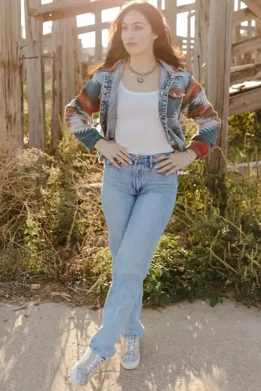 Close-up of chest flap pocket and Aztec contrast sleeve on denim jacket Fashionfitz UK