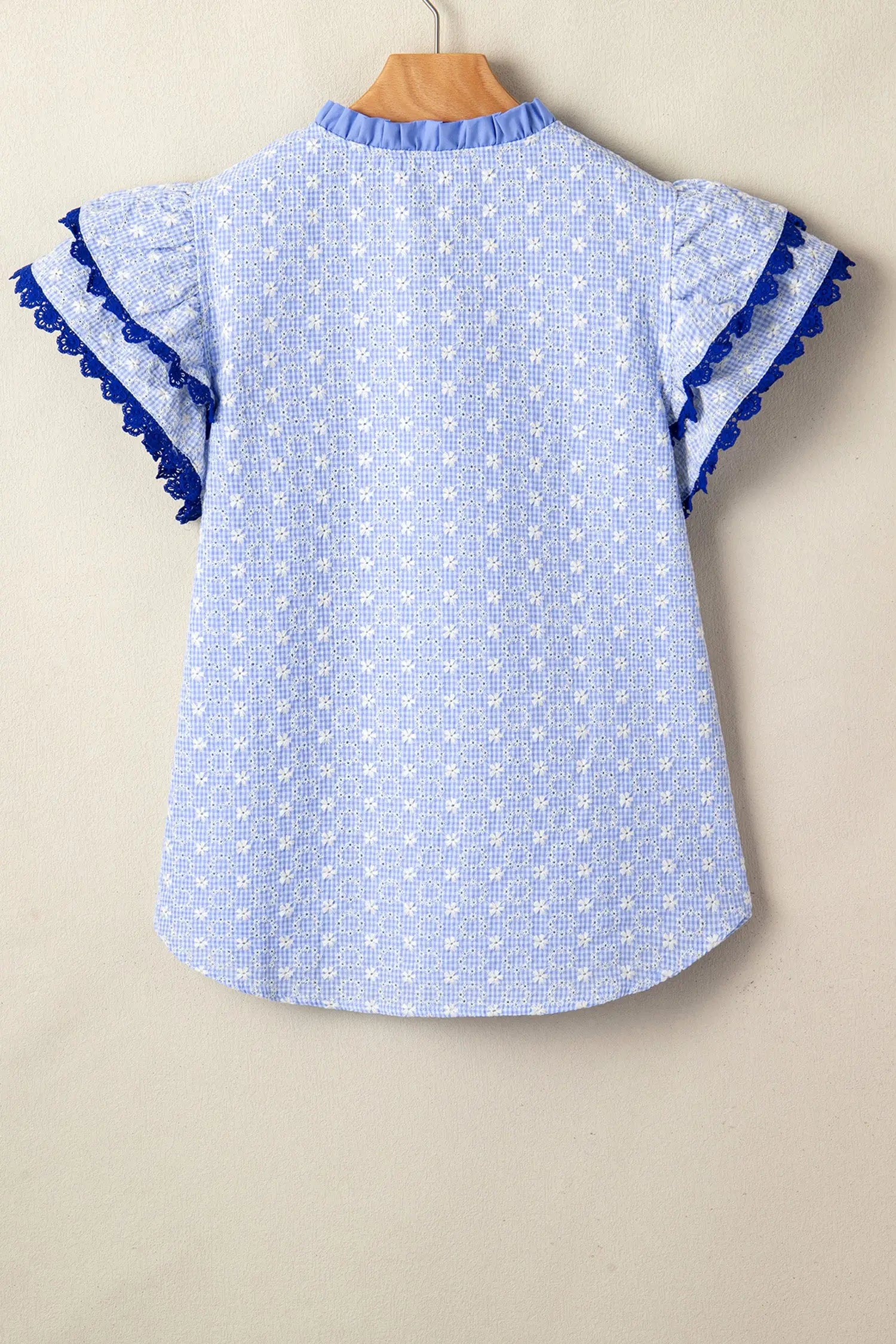 Eyelet embroidered flutter sleeve blouse with lace trim blouses