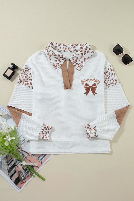 Embroidered Leopard Polo – Chic White Long Sleeve Top with leopard print collar and sleeves, brown bow detail, and 'gameday' text embroidery.