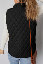 Back view of black Flower‑Quilted Winter Gilet showing floral quilted pattern and padded design for women’s casual winter outerwear.
