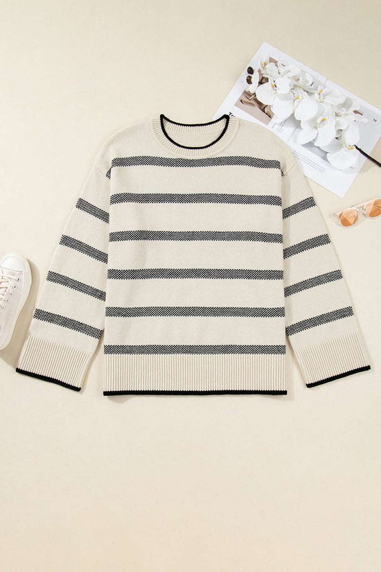 Flat lay of Women's Apricot Striped Bell Sleeve Jumper with accessories, showing full design and soft knit fabric. A stylish striped sweater for fall.