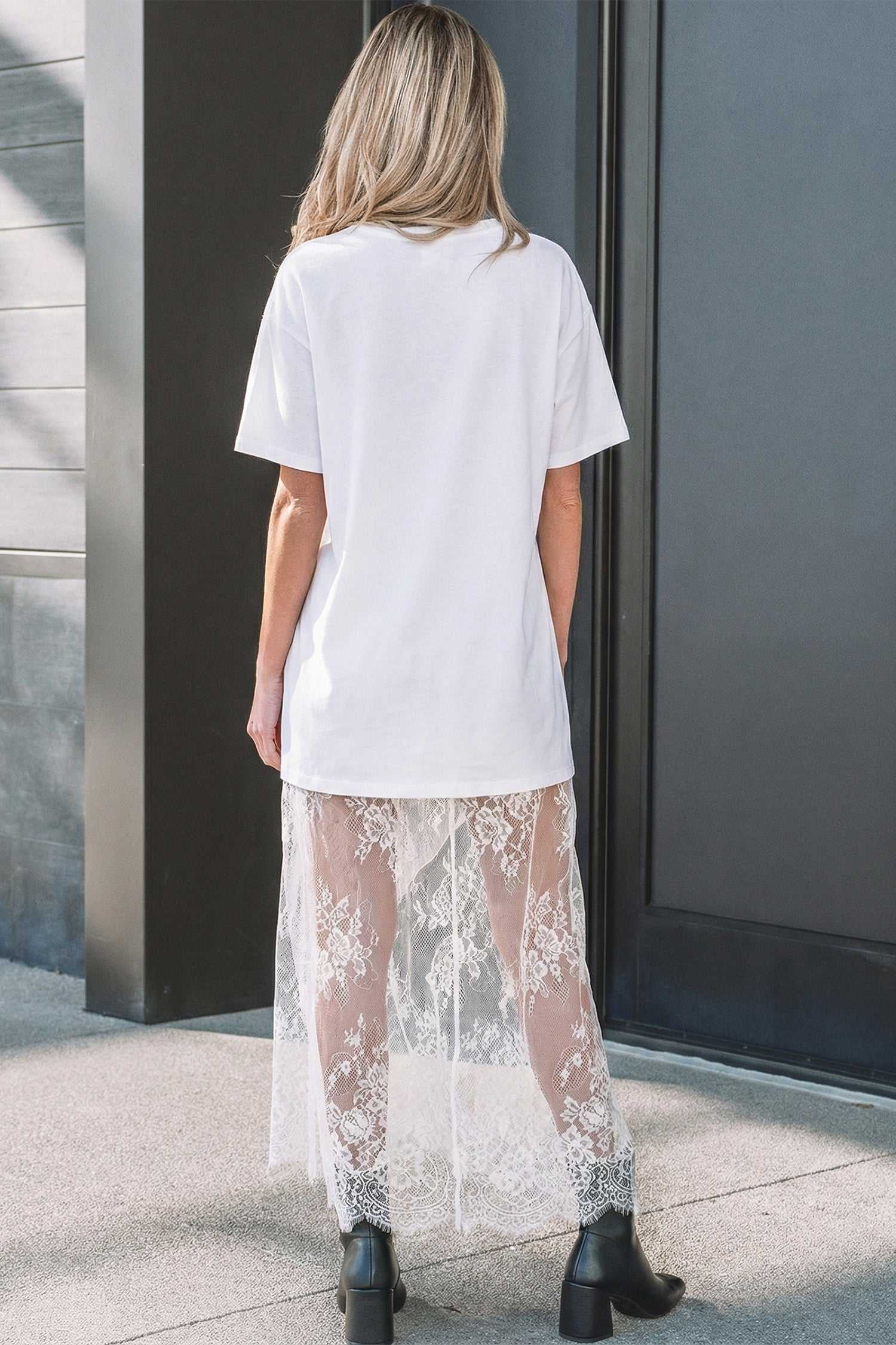 Back view of White Floral Lace Skirt Maxi Dress featuring a sheer floral lace overlay and relaxed fit, ideal for elegant daily wear.