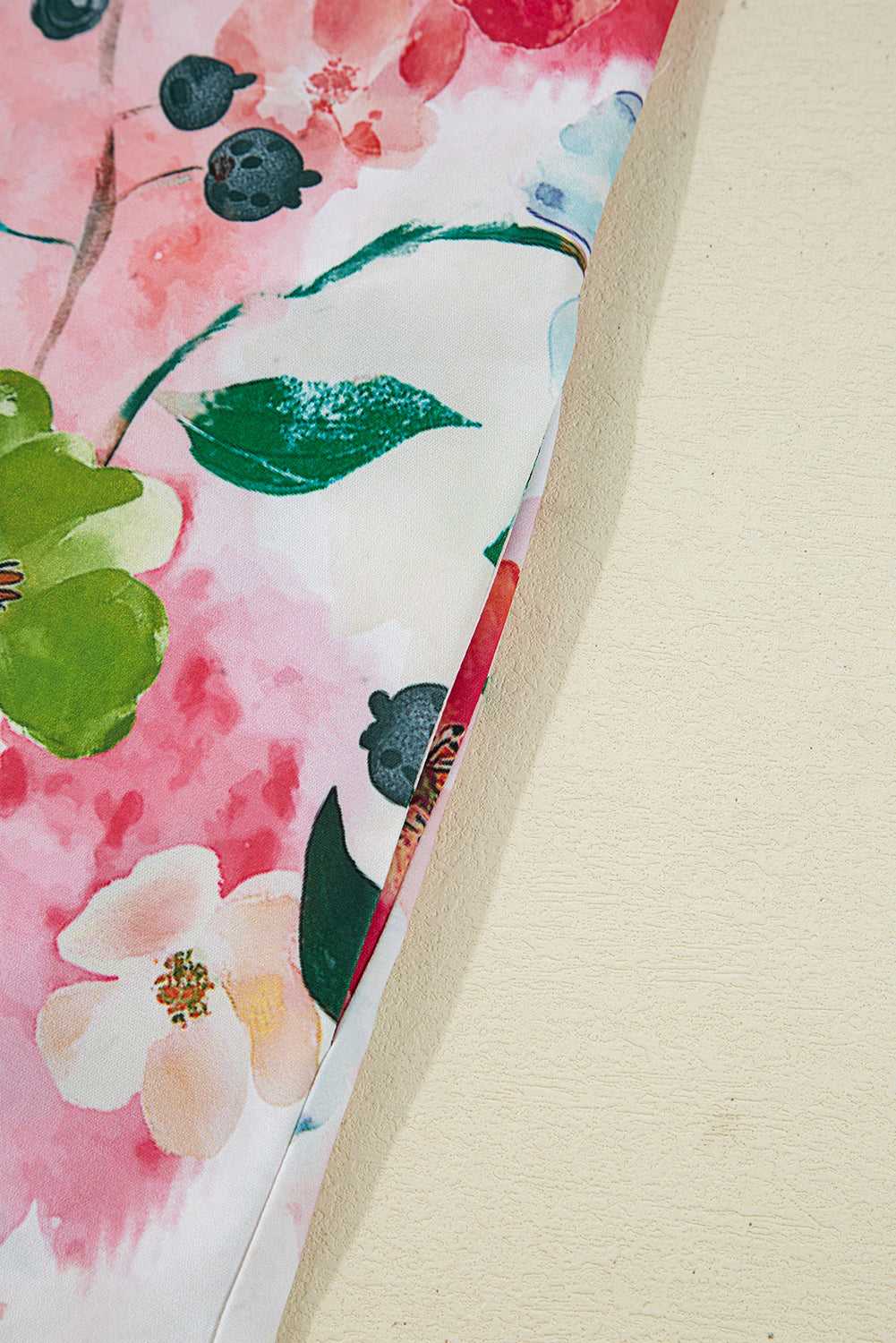 Fabric close-up of Floral Shift Dress - Casual Elegance revealing smooth texture and vibrant floral design.