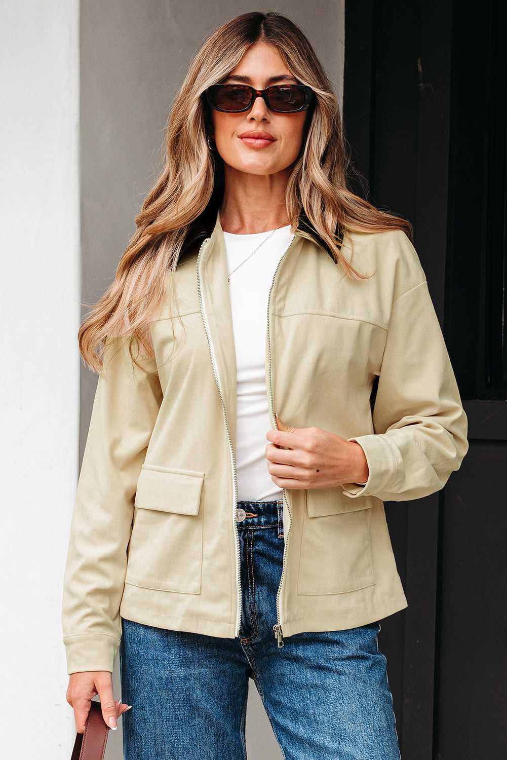 Model wearing Leather Collar Corduroy Jacket with jeans and sunglasses, perfect for casual fall layering and daily wear.