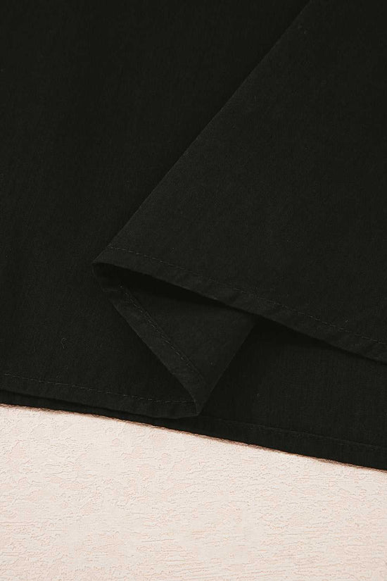 Hem detail of Monochrome Knit Dress - Cozy & Stylish | FashionFitz showing clean stitching and lightweight black skirt fabric.