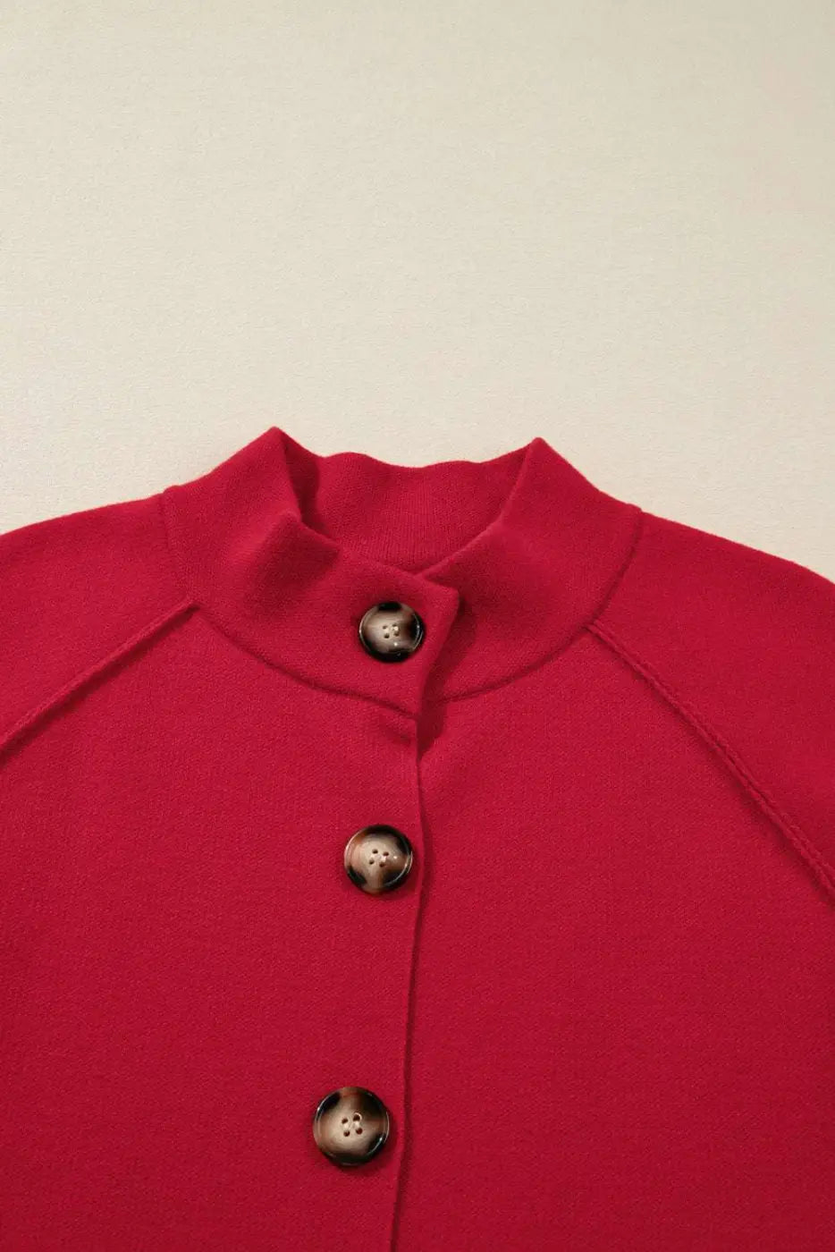 Top view of the Red Collared Wrap Cardigan Jacket showing button details and high neckline for a cozy winter look.