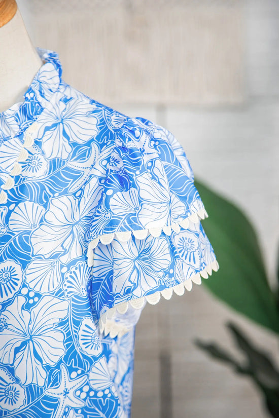 Sky blue oceanic floral scalloped v neck short blouse