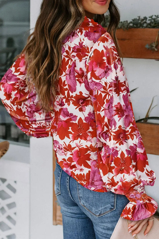 Casual cakewalk floral smocked blouse with ruffles