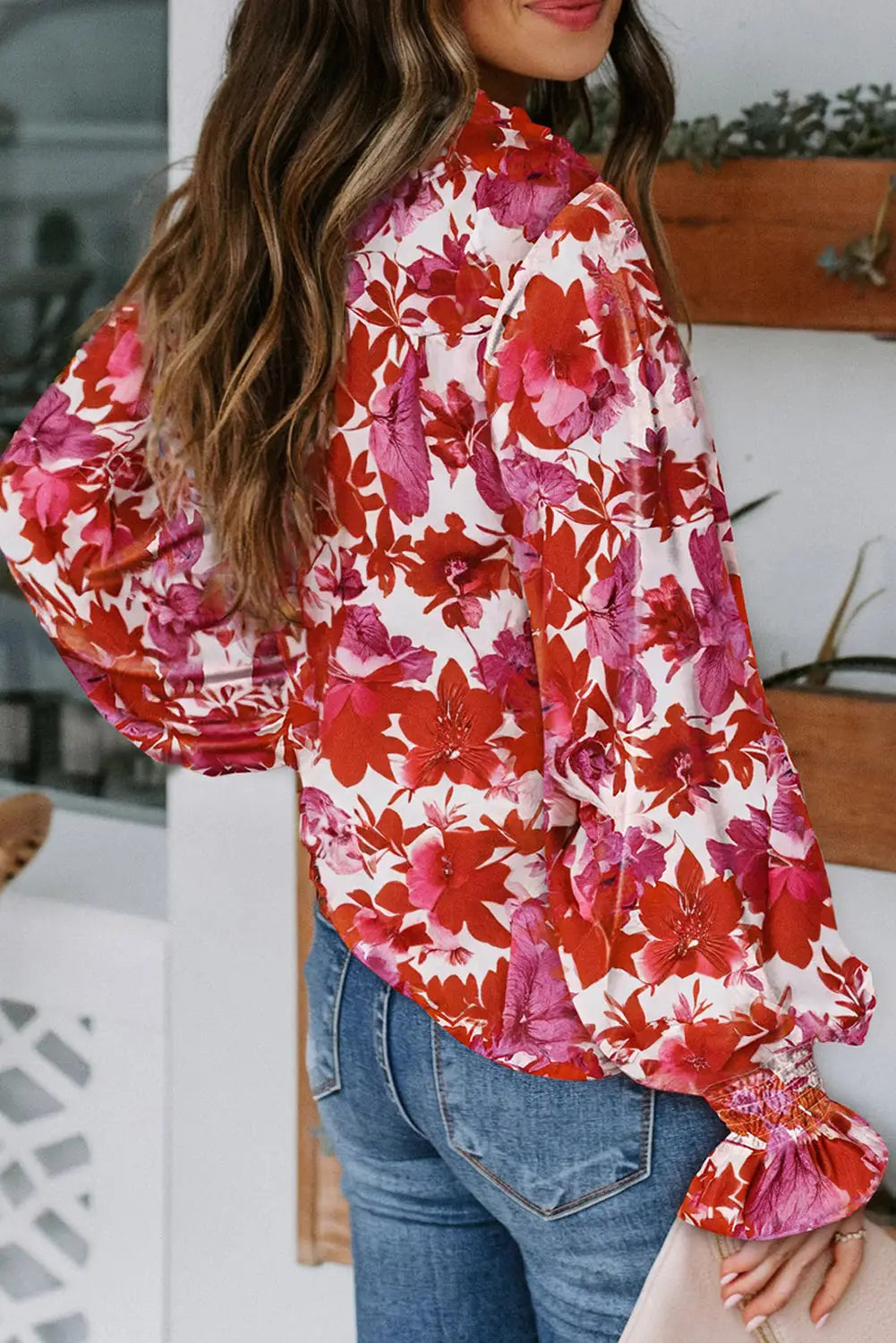 Casual cakewalk floral smocked blouse with ruffles