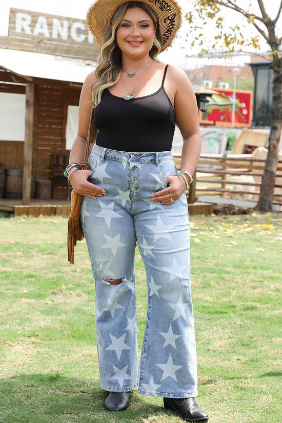Model wearing blue star print distressed plus size jeans with wide-leg fit, styled with a black tank top and summer accessories.