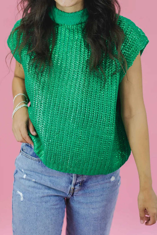 Green high neck knit top for women with short sleeves and lustre finish, styled casually with distressed denim jeans.