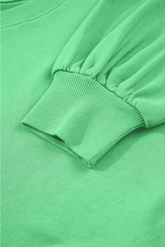 Sleeve cuff detail of green Drop Crop Wide-Leg Pants Set, highlighting ribbed texture and cozy loungewear style.