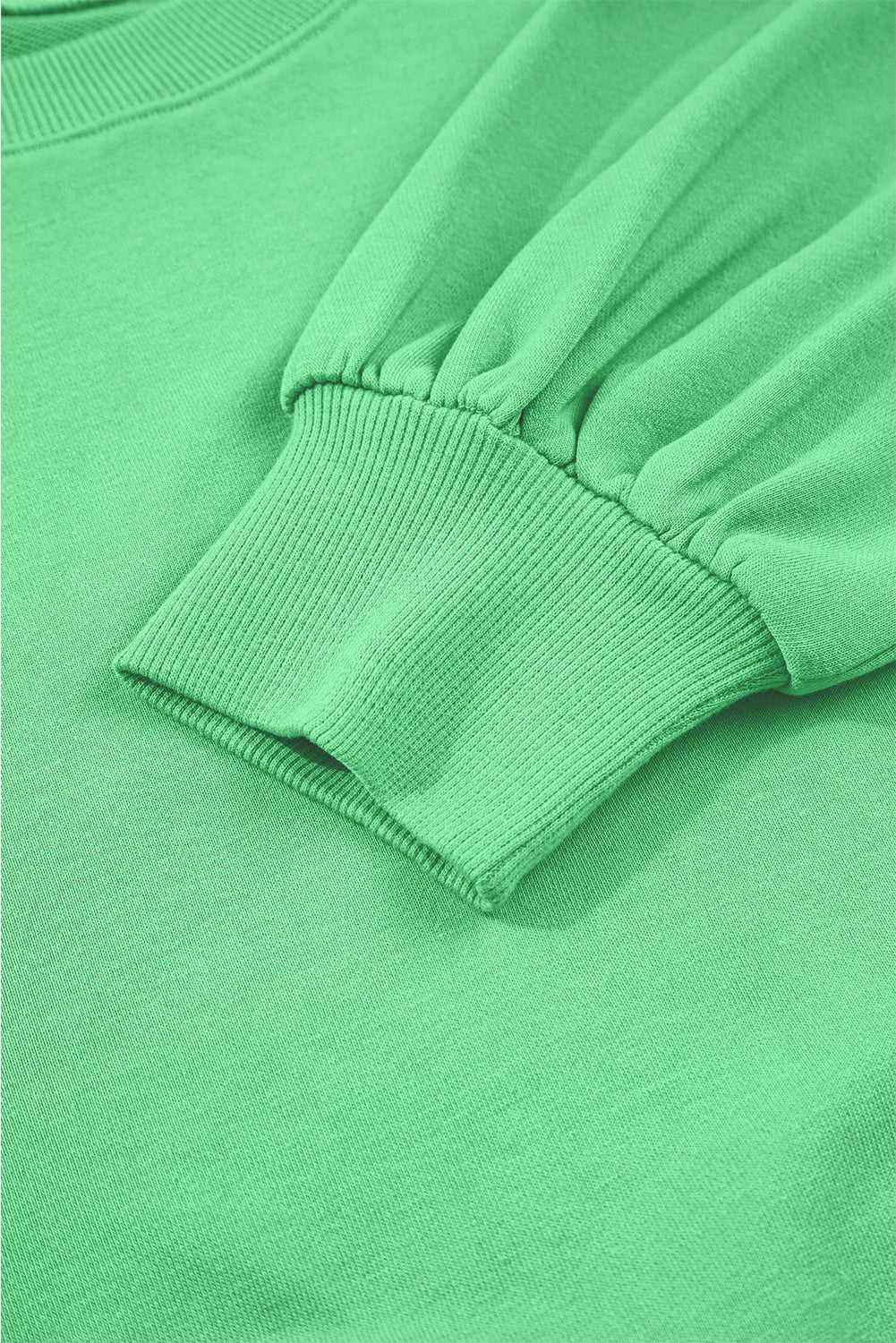 Sleeve cuff detail of green Drop Crop Wide-Leg Pants Set, highlighting ribbed texture and cozy loungewear style.